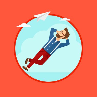 Bulutta yatan işadamı.