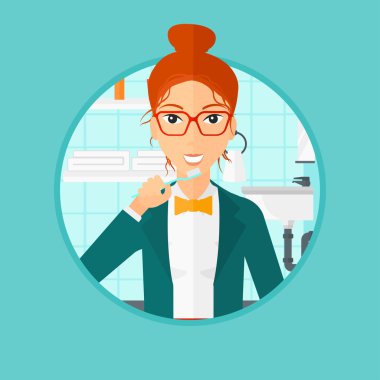 Dişlerini fırçalayan kadın.