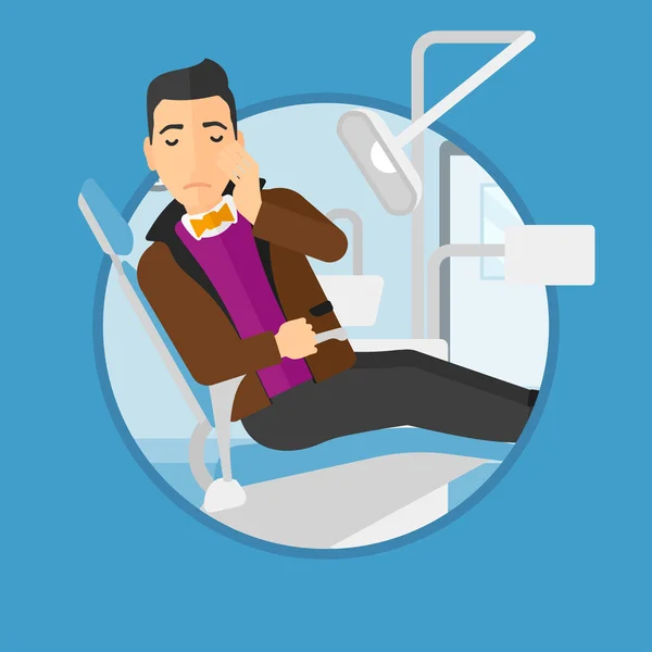 Hombre sufriendo en silla dental . — Vector de stock