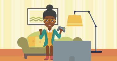 video oyunu oynayan kadın.