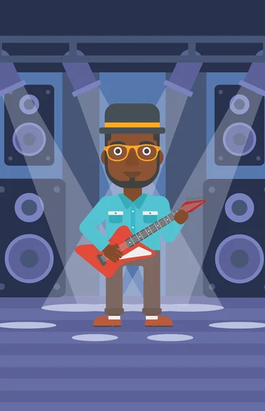 Musician playing electric guitar. — Stock Vector