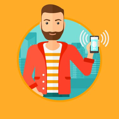 Adam holding zil cep telefonu.