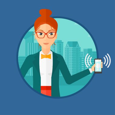 Zil telefon tutan kadın.