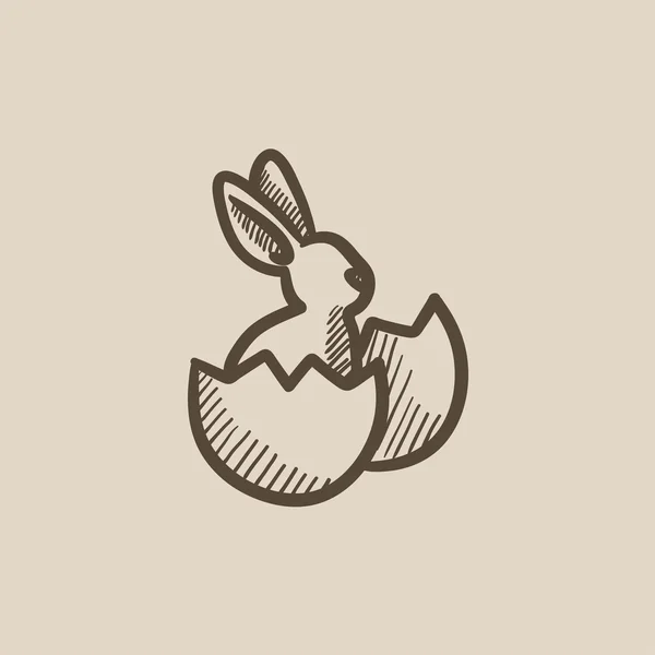 Conejo de Pascua sentado en el icono del boceto de cáscara de huevo . — Vector de stock