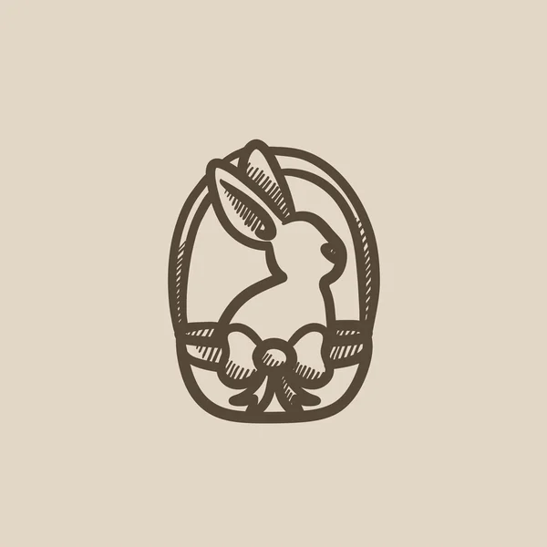 Conejo de Pascua sentado en el icono del boceto de cesta . — Vector de stock