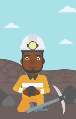 Kömür eller vektör çizim içinde tutarak madenci.