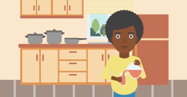 Hamile kadın suyu döküyor.