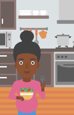 sebze ve meyveler ile hamile kadın.