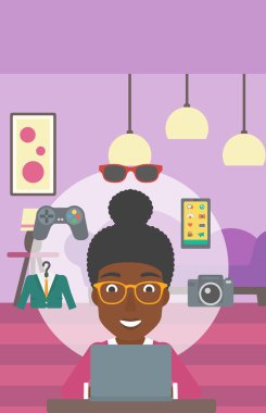 Woman shopping online using her laptop.