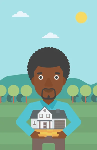 Homme tenant maison modèle vectoriel illustration . — Image vectorielle