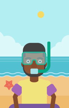 Şnorkel, palet sahilde olan adam.