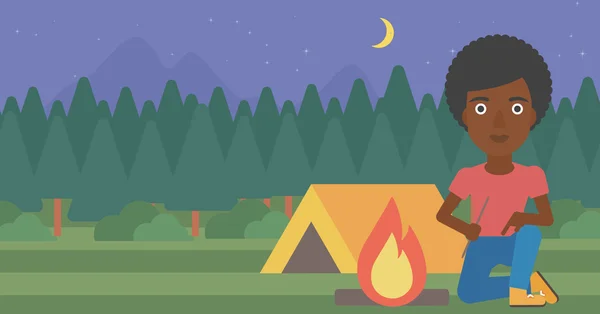 Woman kindling campfire vector illustration. — Stock Vector