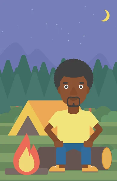 Man sitting on log in the camping. — Stock Vector