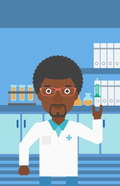 Laboratuvarda şırınga ile laboratuvar asistanı.