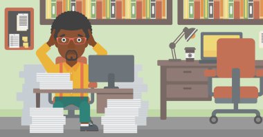 Umutsuzluk içinde iş adamı ofiste oturuyor.