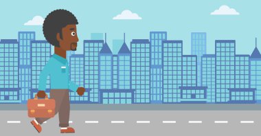 Evrak çantası ile yürüyüş başarılı iş adamı.