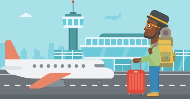 adam havaalanında bavul ile.