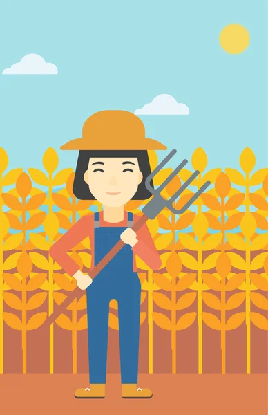 Female farmer with pitchfork vector illustration. — Stock Vector