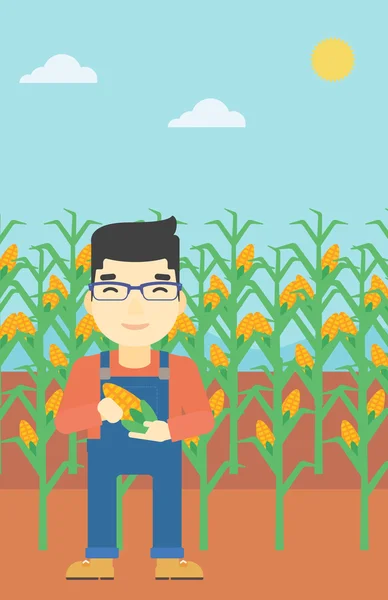 A mezőgazdasági termelő, aki kukoricavektor illusztrációt. — Stock Vector