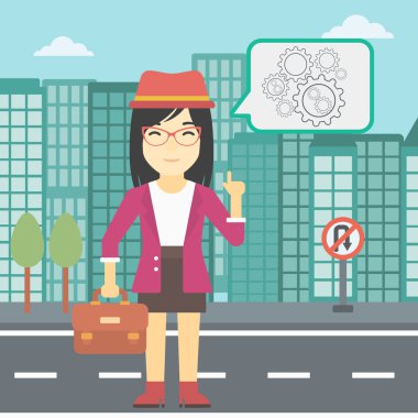 Business woman pointing at cogwheels.