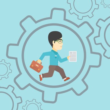 Dişli içinde çalışan işadamı.