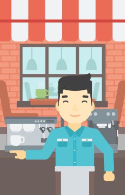 Barista ayakta yakınındaki kahve makinesi.