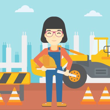 Kask ile mühendis ve blueprint.