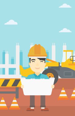 Bir plan tutan mühendisi.