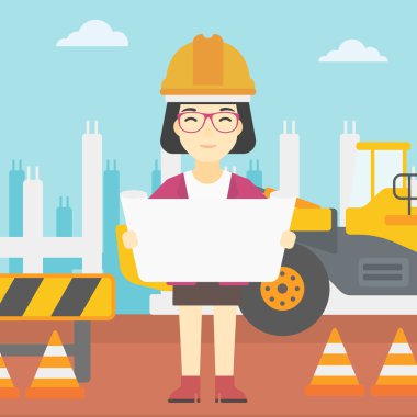 Bir plan tutan mühendisi.