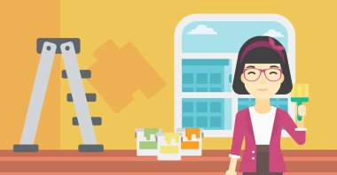 Boya fırçası ile ressam.