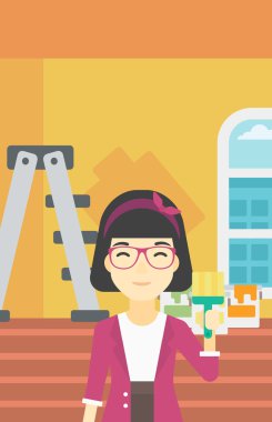 Boya fırçası ile ressam.