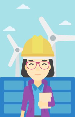 Güneş enerjisi Santrali ve rüzgar çiftliği kadın işçi.