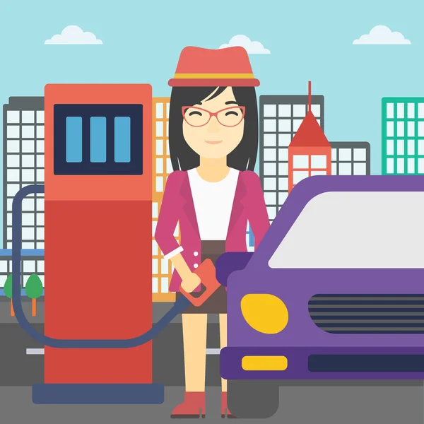 Працівник заповнює паливо в автомобіль . — стоковий вектор