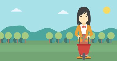 Bitki ve el arabası olan kadın.