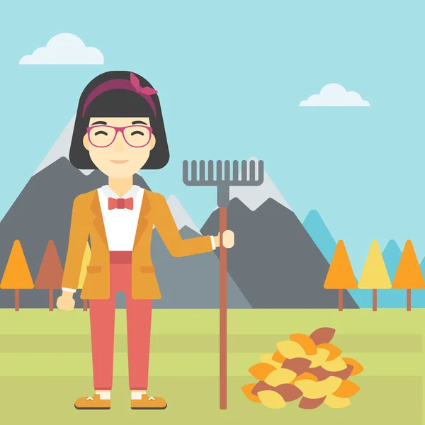 Woman raking autumn leaves vector illustration. — Stock Vector