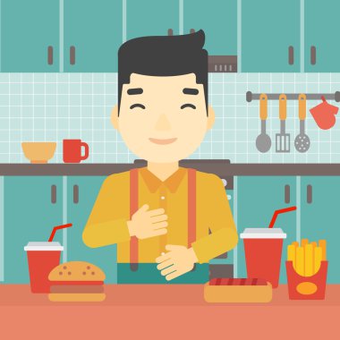 Memnun adam fast food yemek.