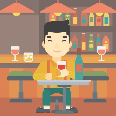 Restoranda şarap içme adam.