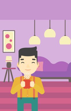 Adam sıcak kahve keyfi.