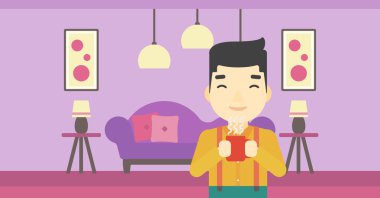 Adam sıcak kahve keyfi.