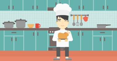 Şef tencere tutarak kavrulmuş tavuk.