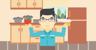 Adam elma ve cupcake arasında seçim yapma.