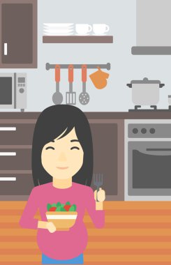 sebze ve meyveler ile hamile kadın.