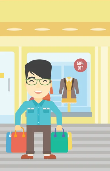 ショッピング バッグのベクトル図と幸せな男. — ストックベクタ