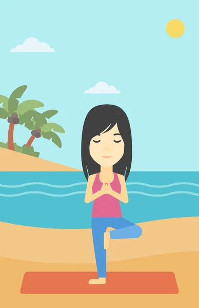 Woman practicing yoga tree pose on the beach. — Stockvector