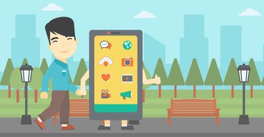 Büyük smartphone ile yürüyen adam.