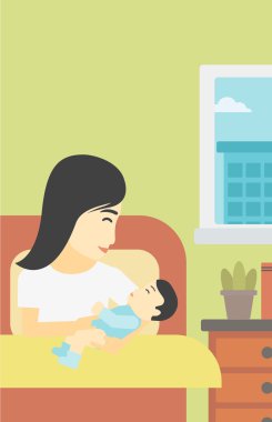 Woman with new born in maternity ward.