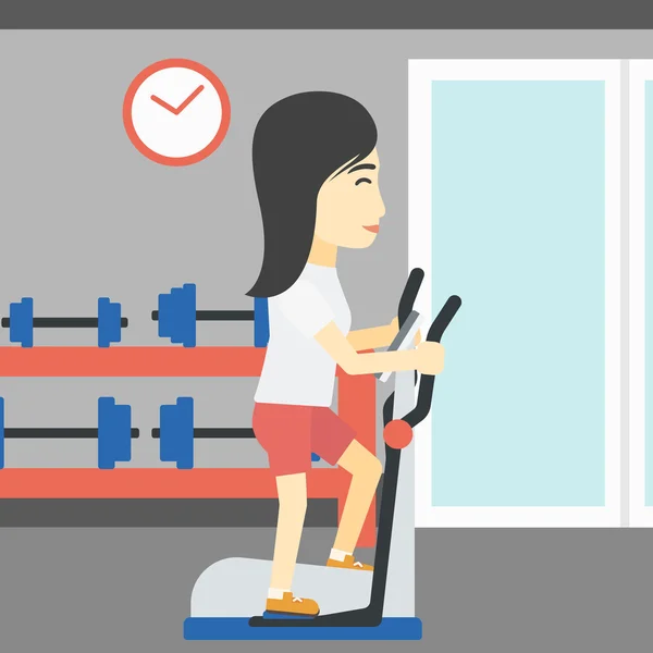 Woman exercising on elliptical trainer. — Stock Vector