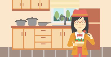 sağlıklı sebze salatası yiyen kadın.