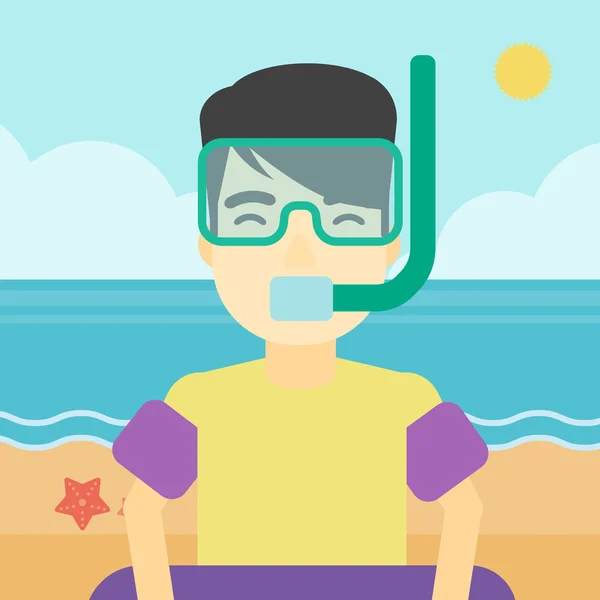 Man with snorkeling equipment on the beach. — Stock Vector