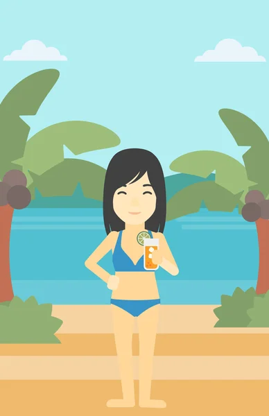 Mujer con cóctel en la playa . — Vector de stock